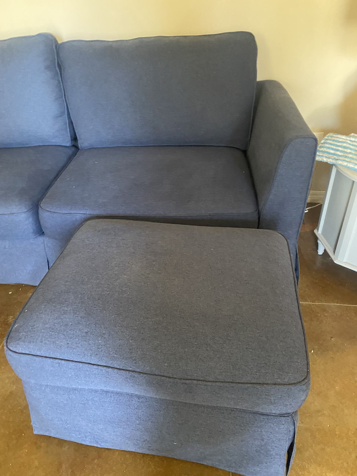 Blue Upholstery Couch And Ottoman