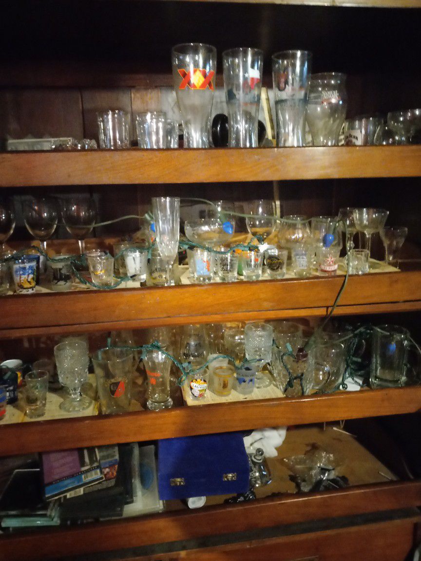 Glass Barware, 100 + Shot Glasses,  Crystal Decanters,  Gold Rimmed Rocks Glasses,  Beer Steins, Crystal Champagne  Flutes, A Lot More