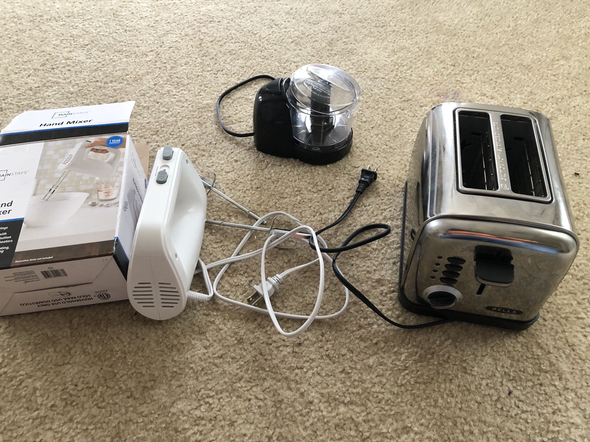 Bread toaster , hand mixer , vegetables chopper