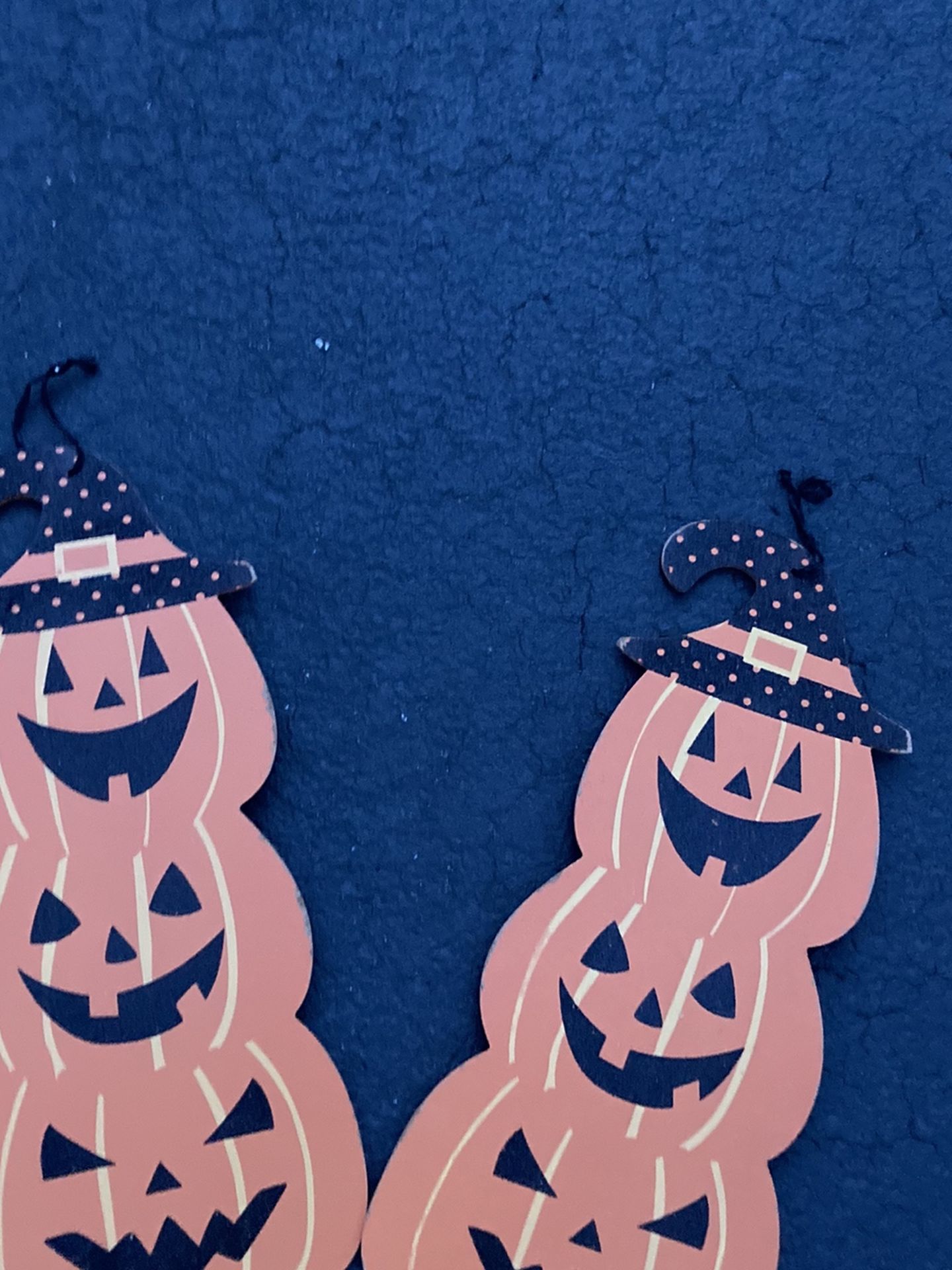 Two topiary pumpkin wall hangers