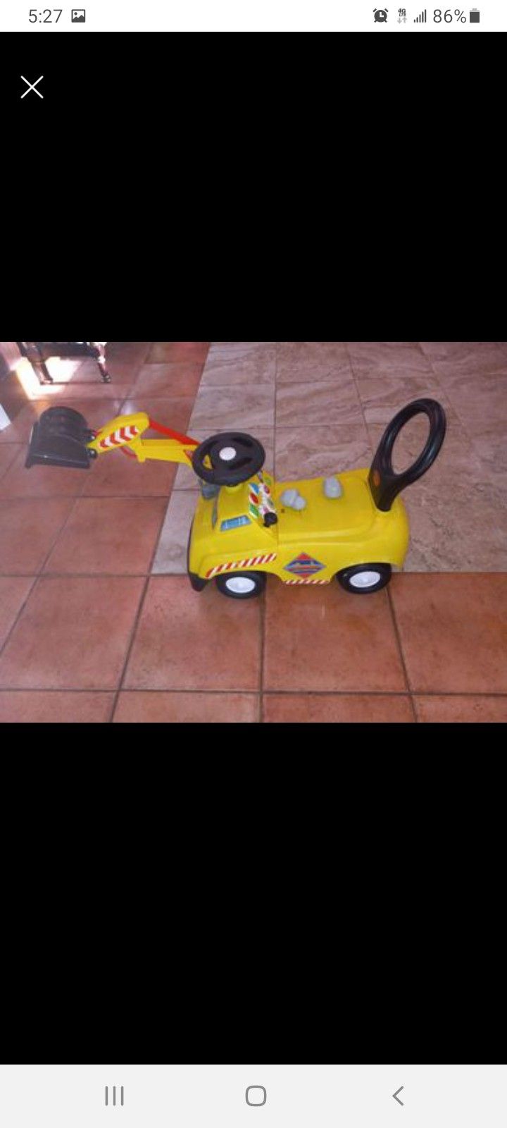 Kiddyland, Ride On Construction Excavator with Grey Plastic Rocks.