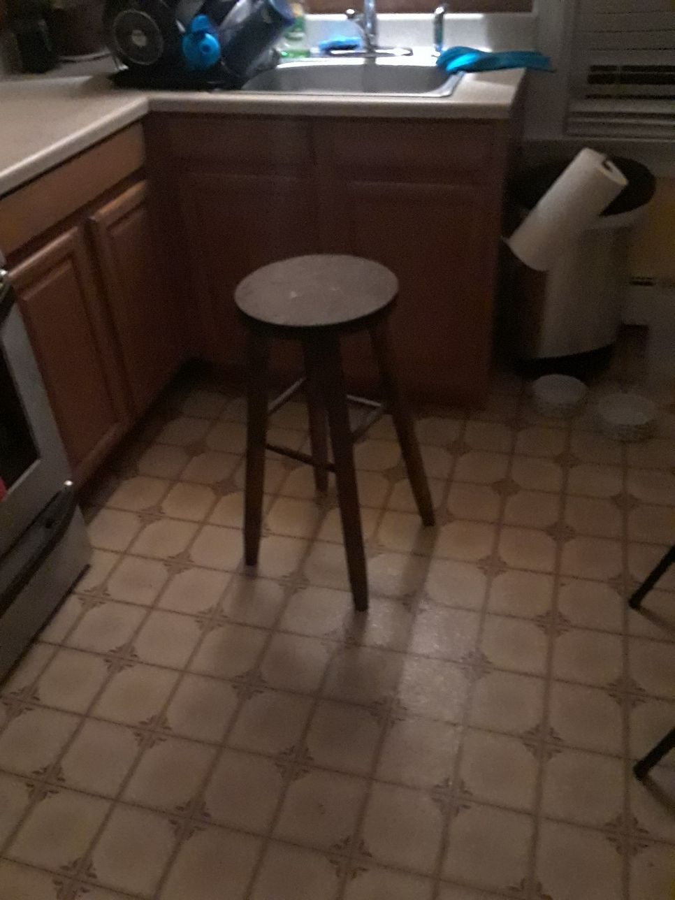 Brown wooden stool..4ft tall