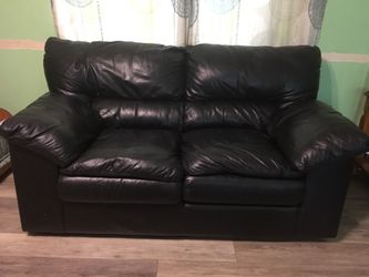 Black leather love seat and oversized chair Thumbnail
