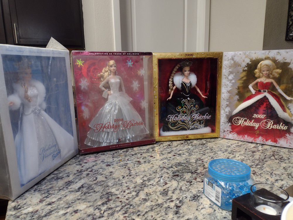 Never Opened Holiday Barbie Collection