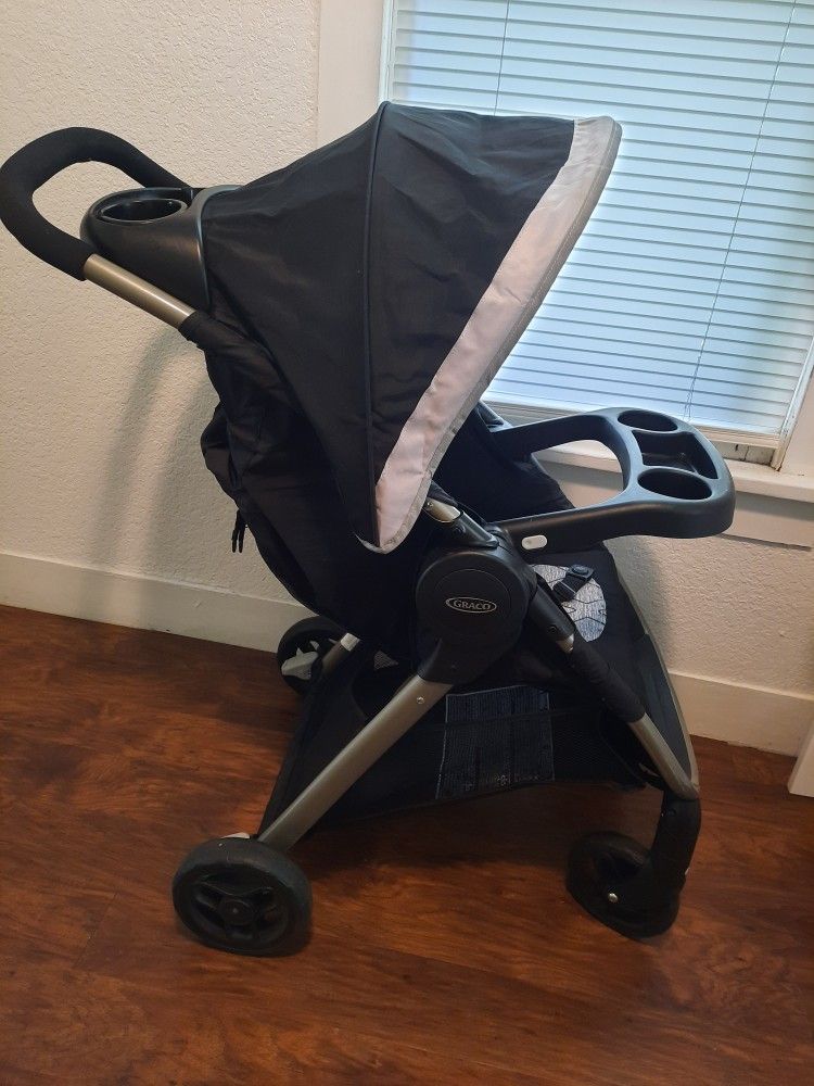 Graco FastAction Fold SE Travel System With SnugRide Infant Car Seat And Stroller