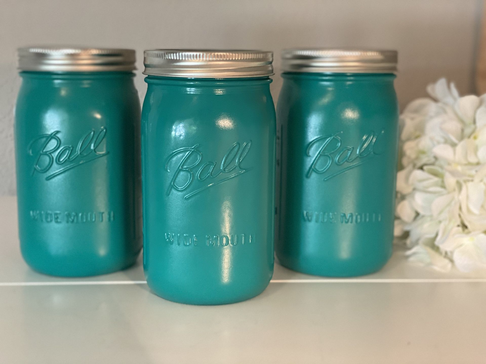 Set of three hand painted mason jars