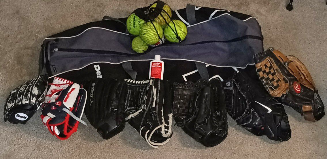 Misc. Baseball Equipment. 1 Demarini Bag, 8 Gloves Men, Woman, Children, Misc. Softballs And Baseballs, And 1 Bottle Glove Conditioner