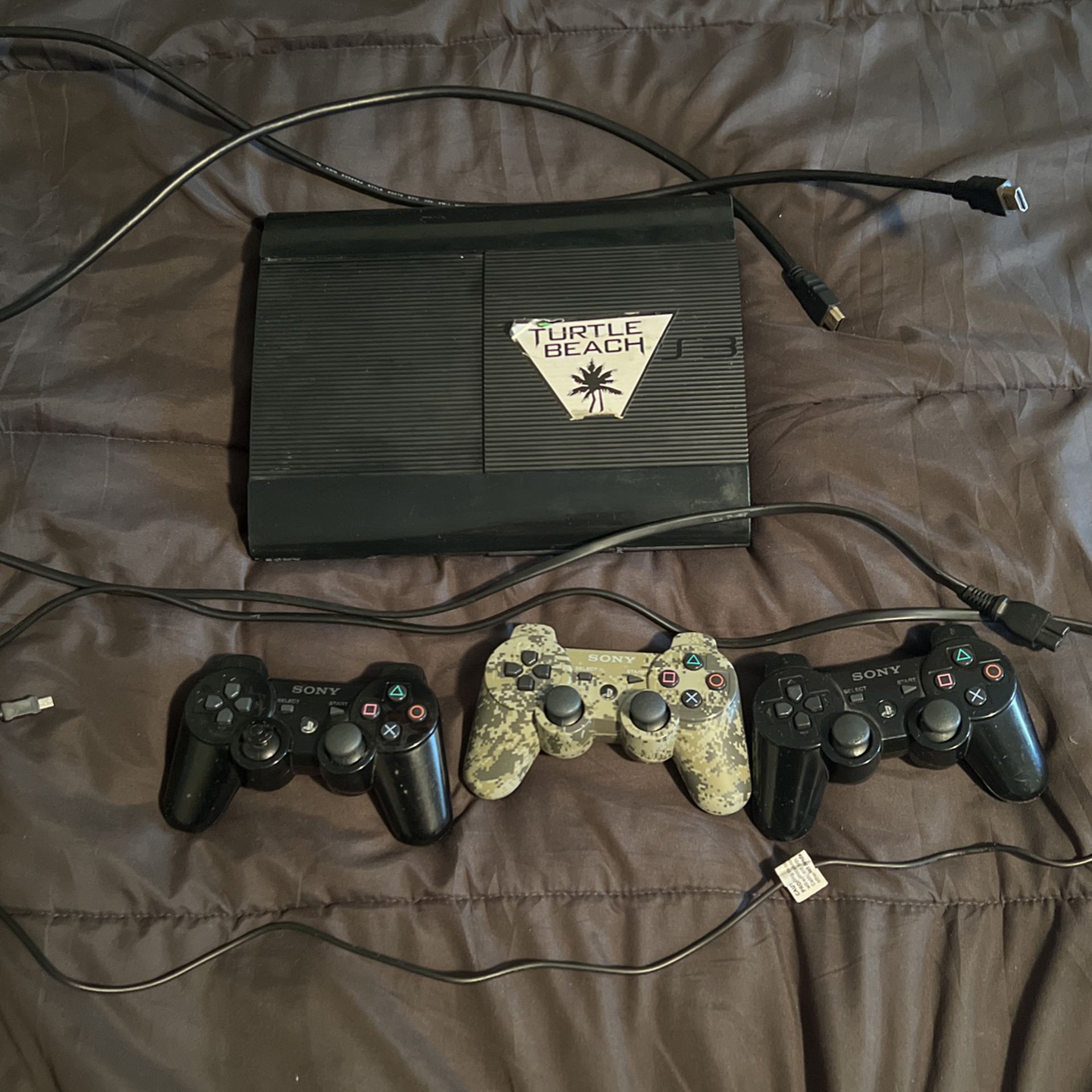 PS3 with 3 controlers, HDMI cable, Power cord and charging cord for controlers 