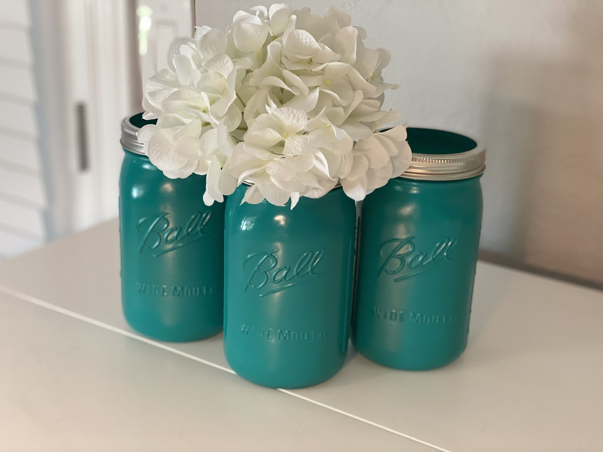 Set of three hand painted mason jars