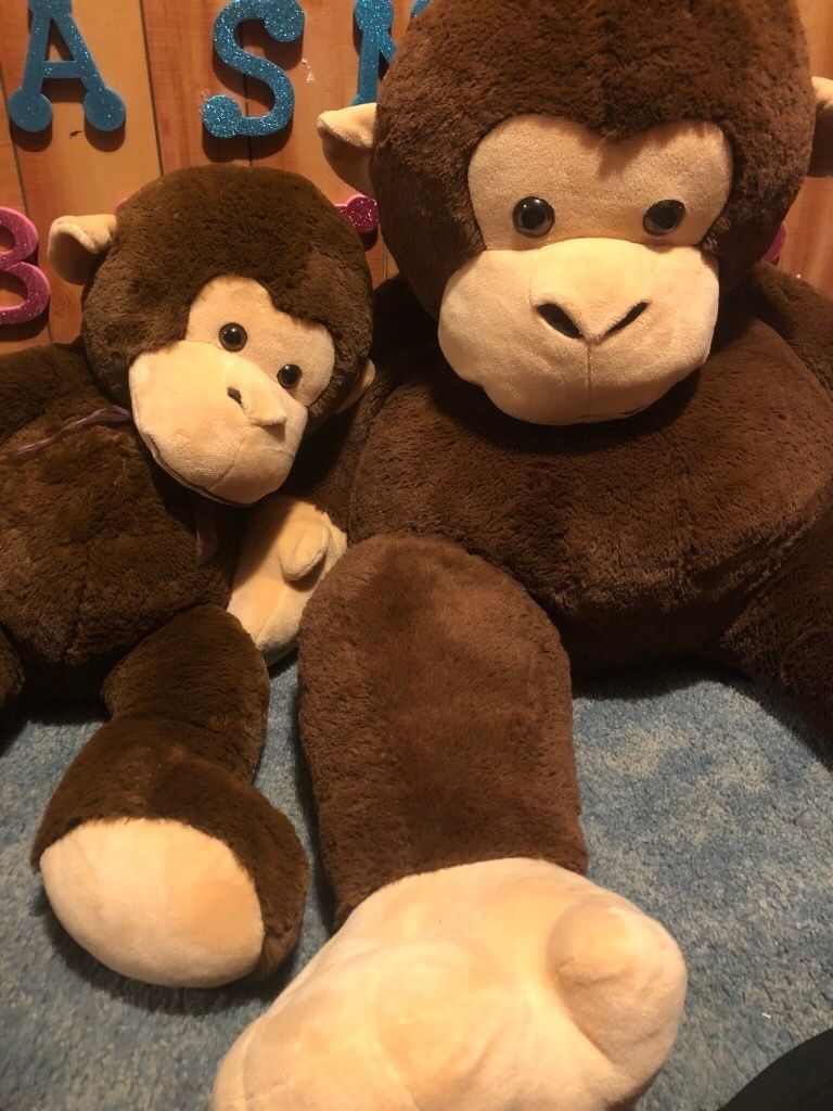 2 stuffed monkeys