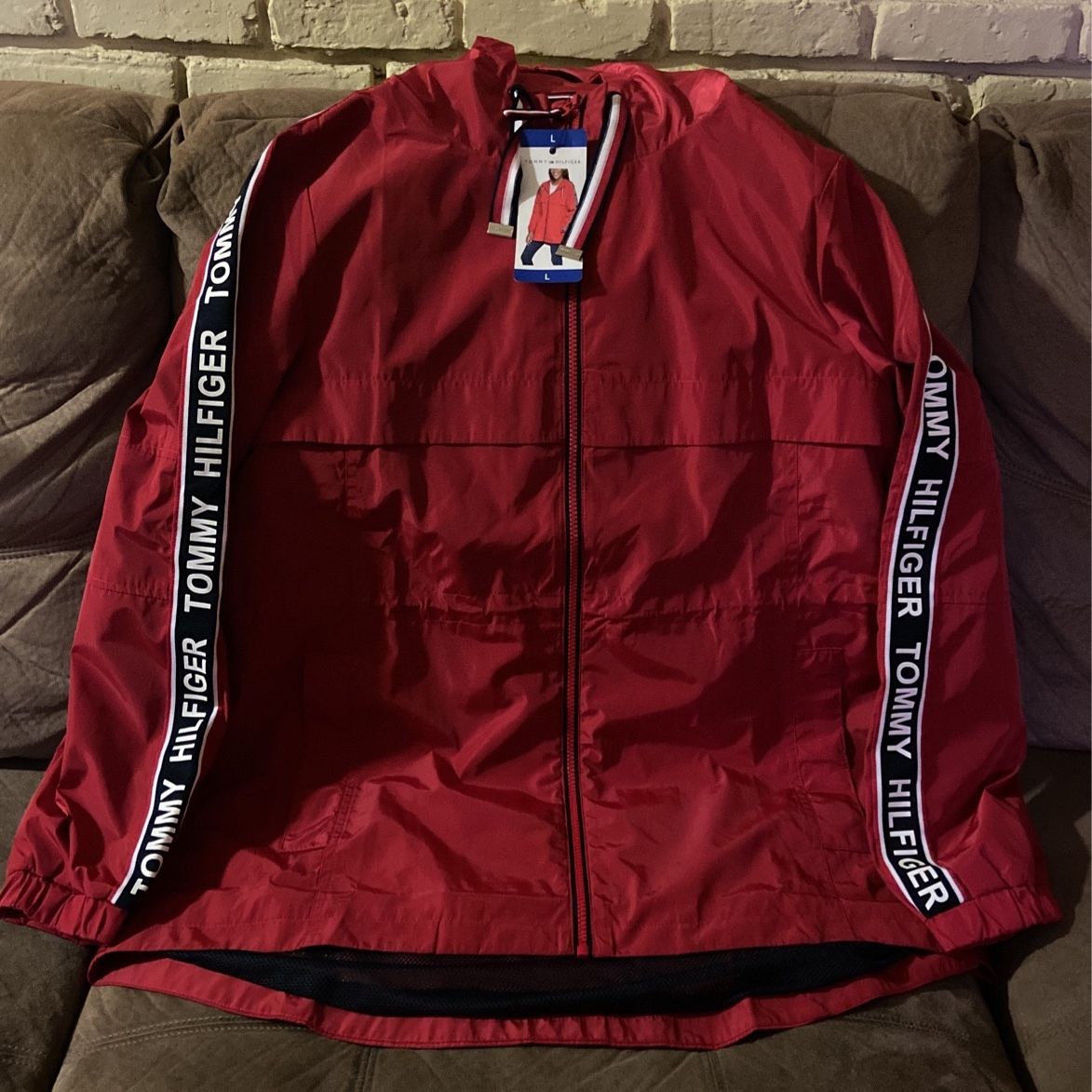 Tommy HilfigerLadies rain jackets .in Red And White