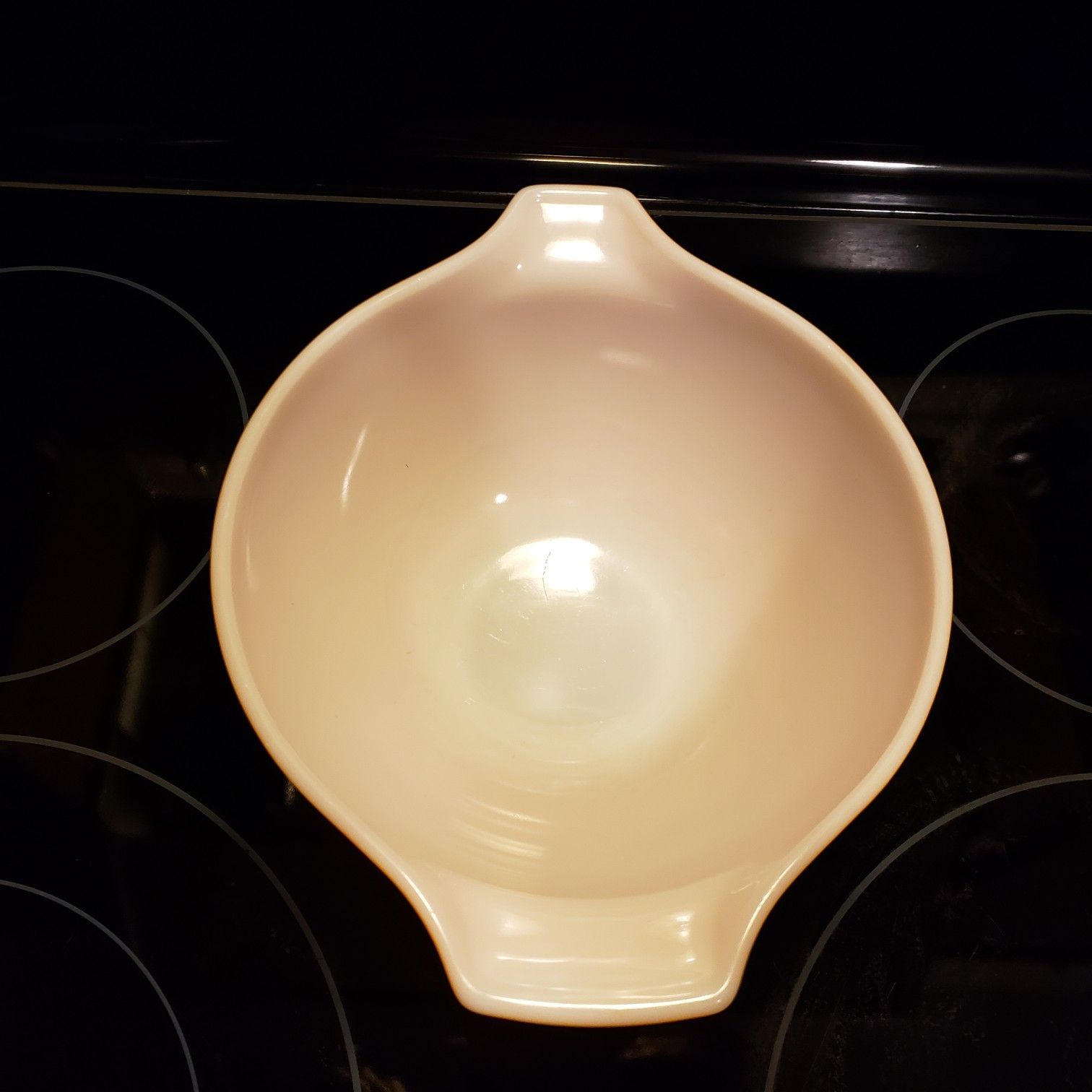 Pyrex small orange bowl..