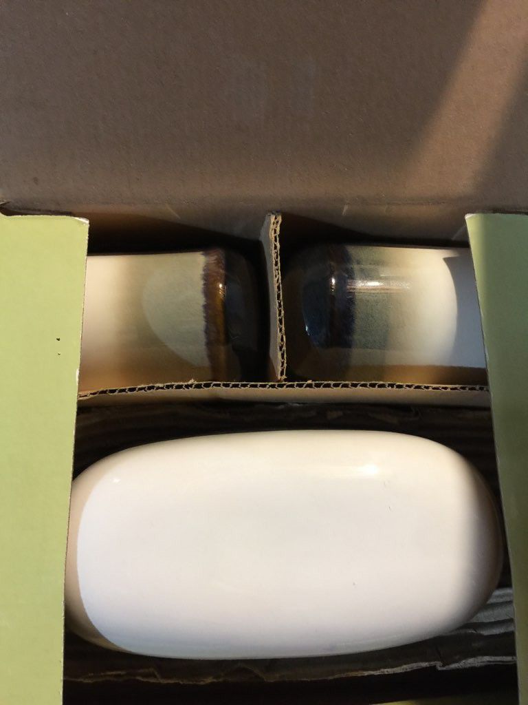New in box salt and pepper set with matching butter dish