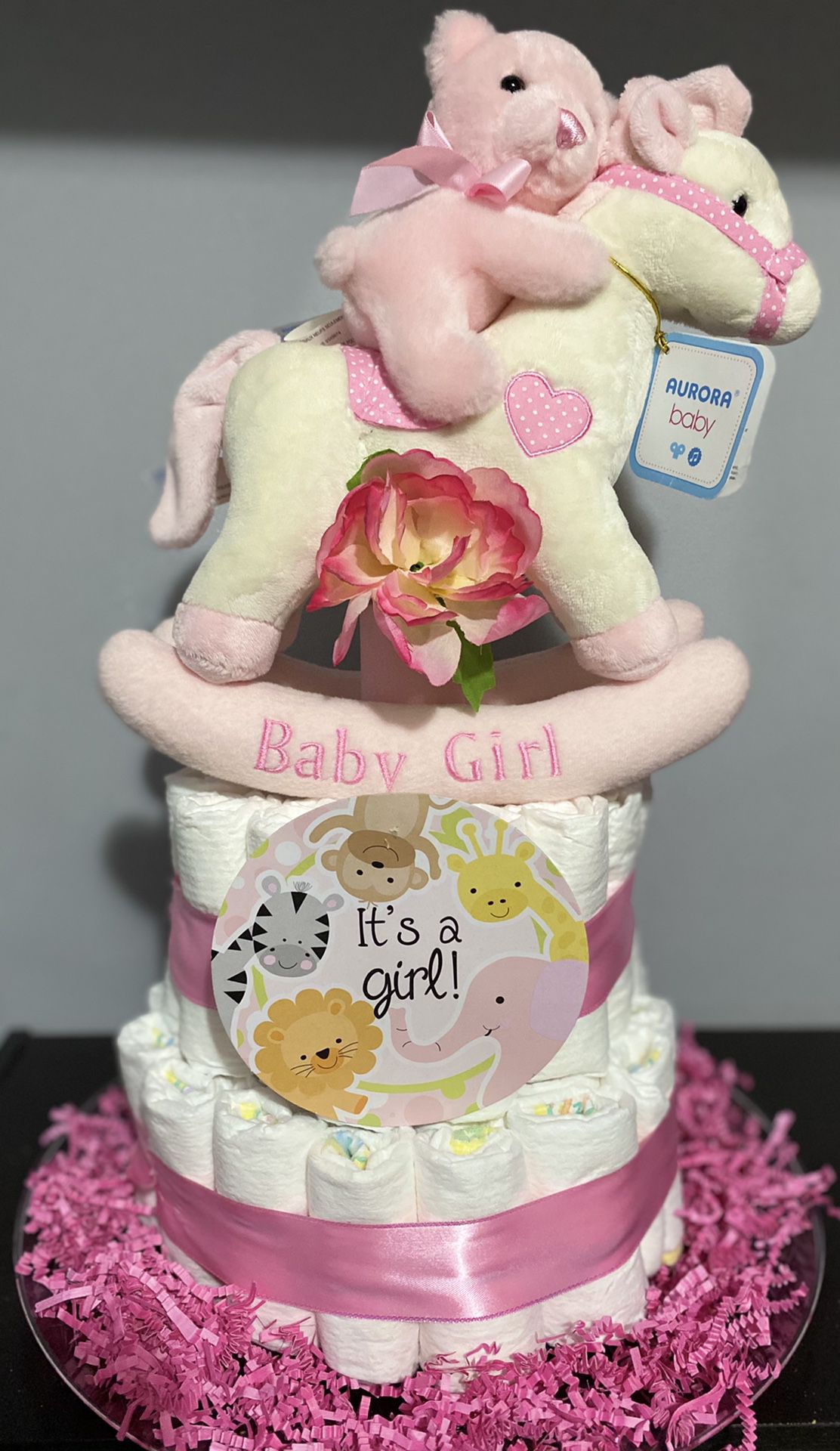 Diaper cake with musical toy