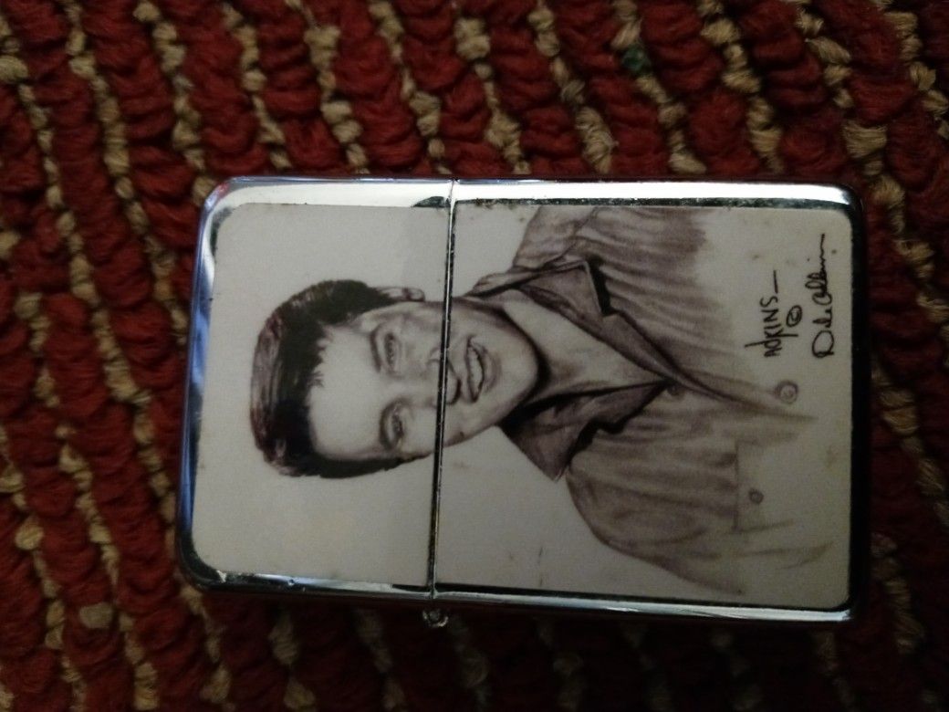 Young Elvis Lighter new never used