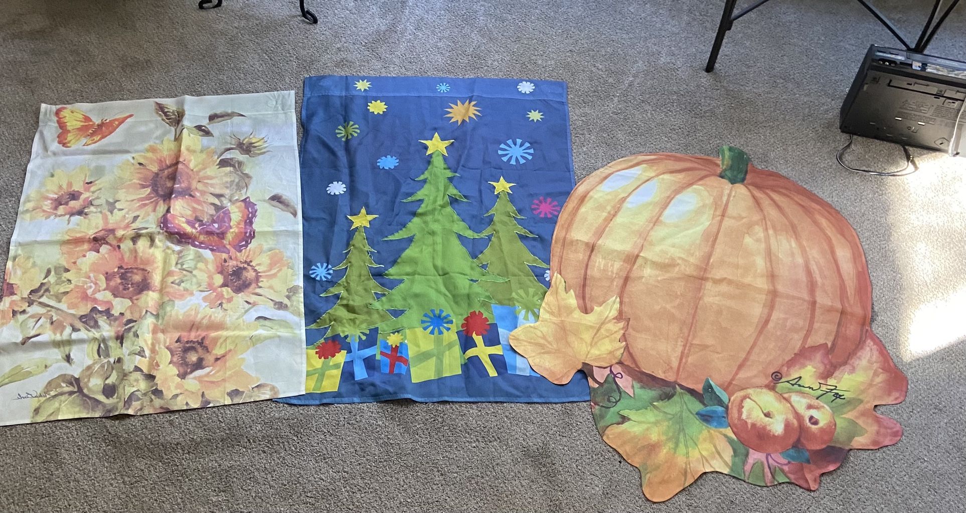 Three large decorative flags