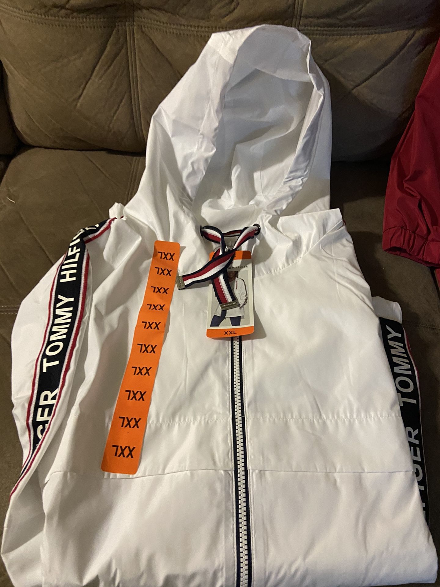 Tommy HilfigerLadies rain jackets .in Red And White