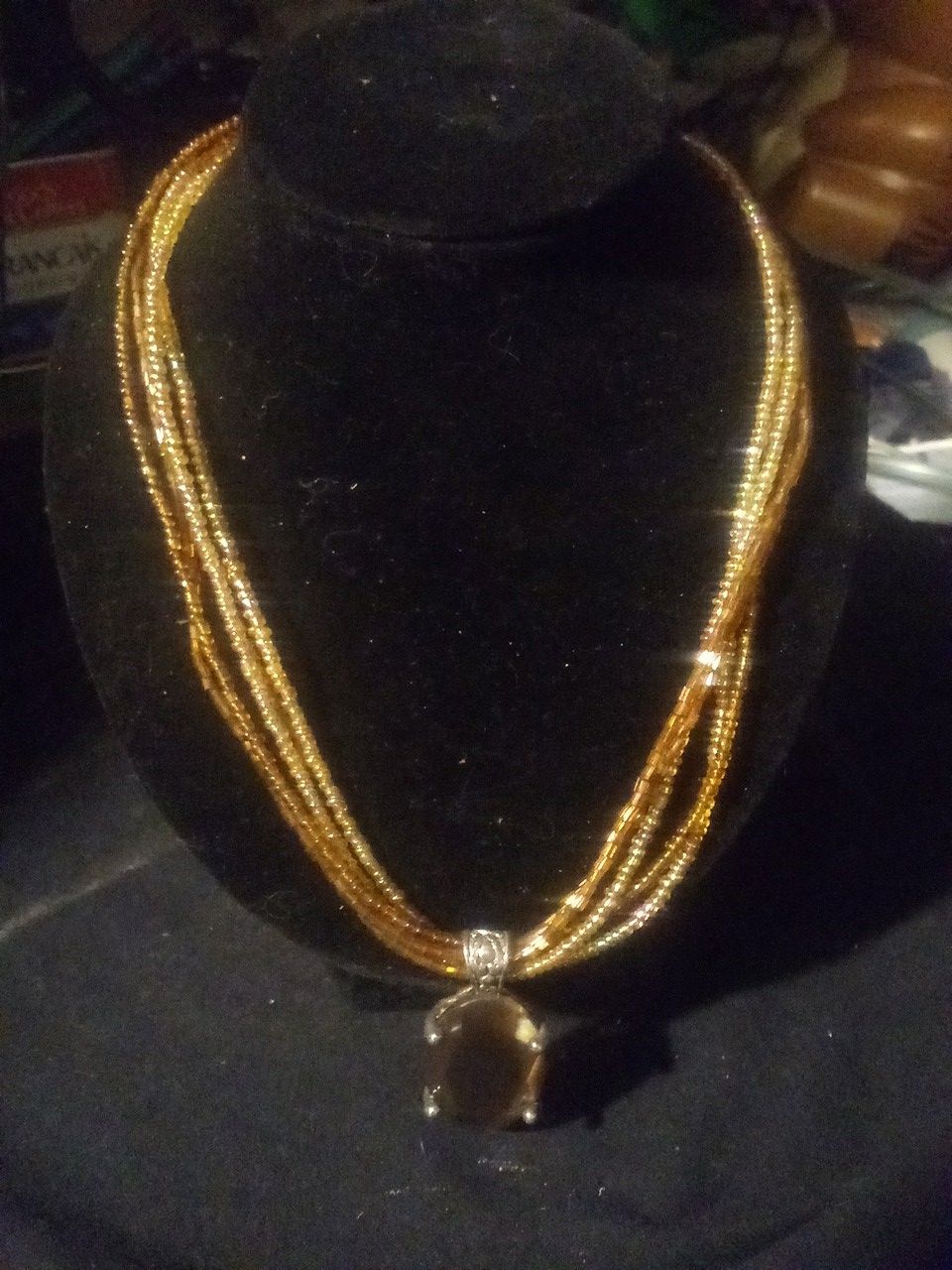 Earth tone pendant on beaded necklac3
