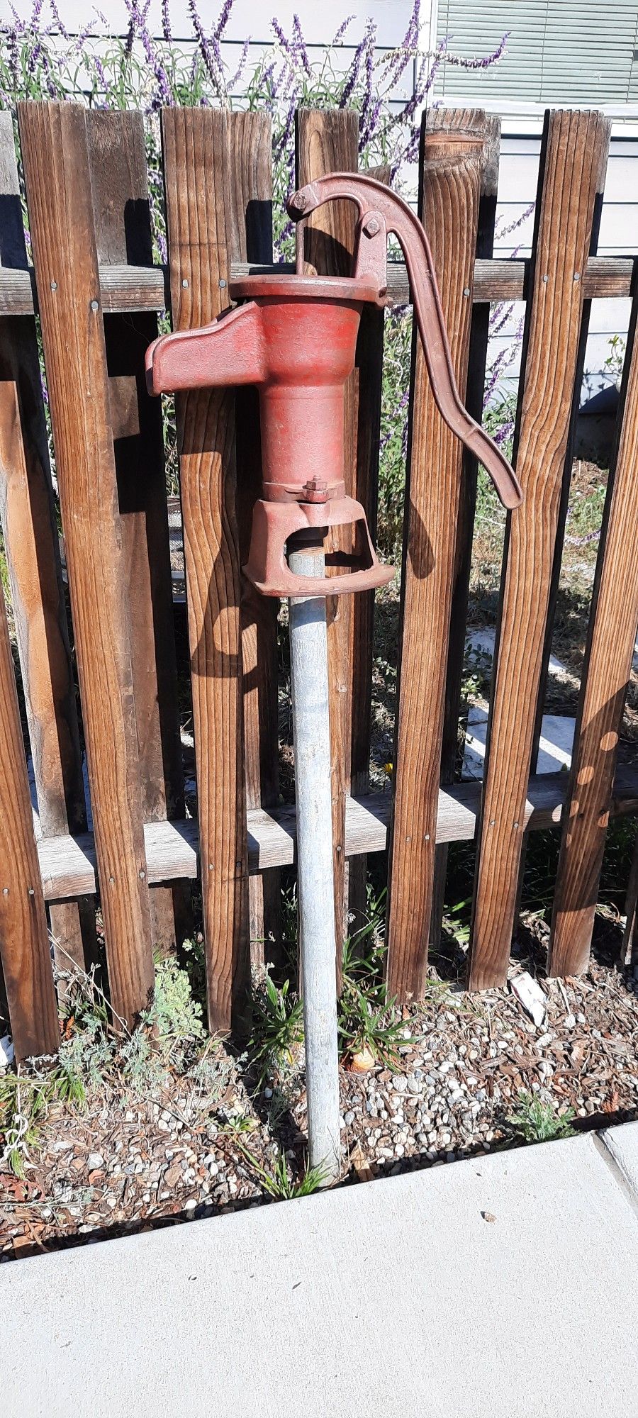 Water Pump and Tractor Seat for Garden Display Or Actual Use