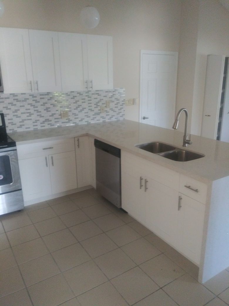 Solid wood kitchen complete with quartz