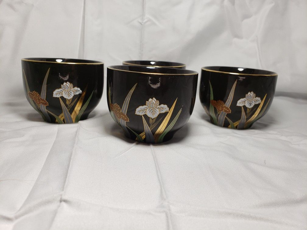 Vintage Ottagiri japan tea cups black with floral design good condition and smoke free home. Measures 2 1/2" T X 3" W .