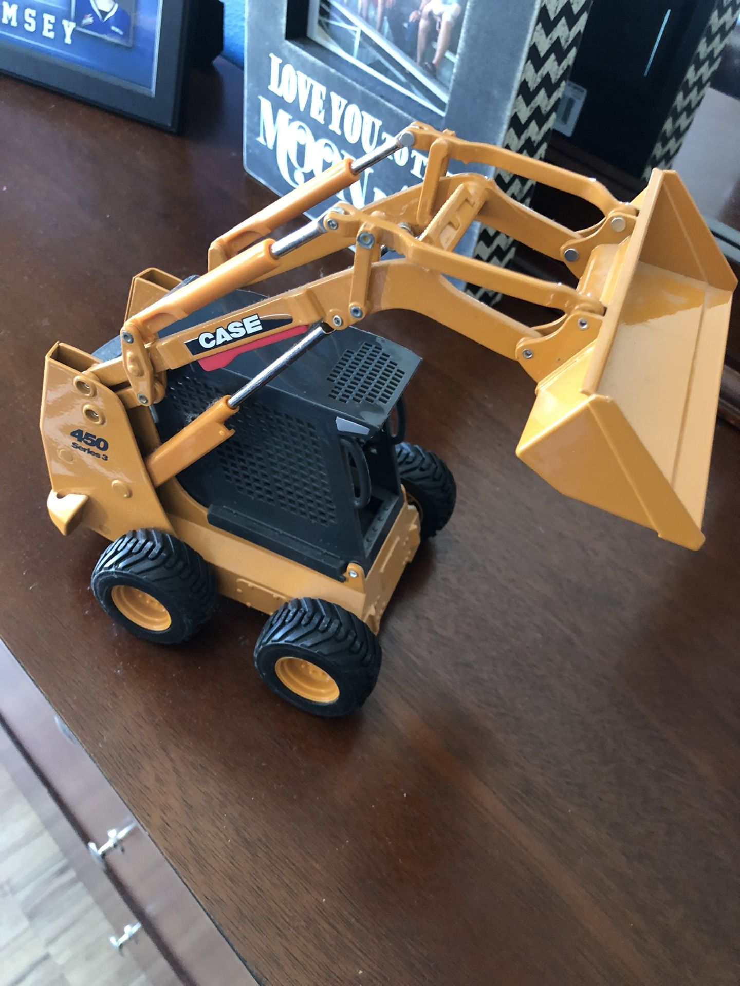 Metal model bobcat excavator.