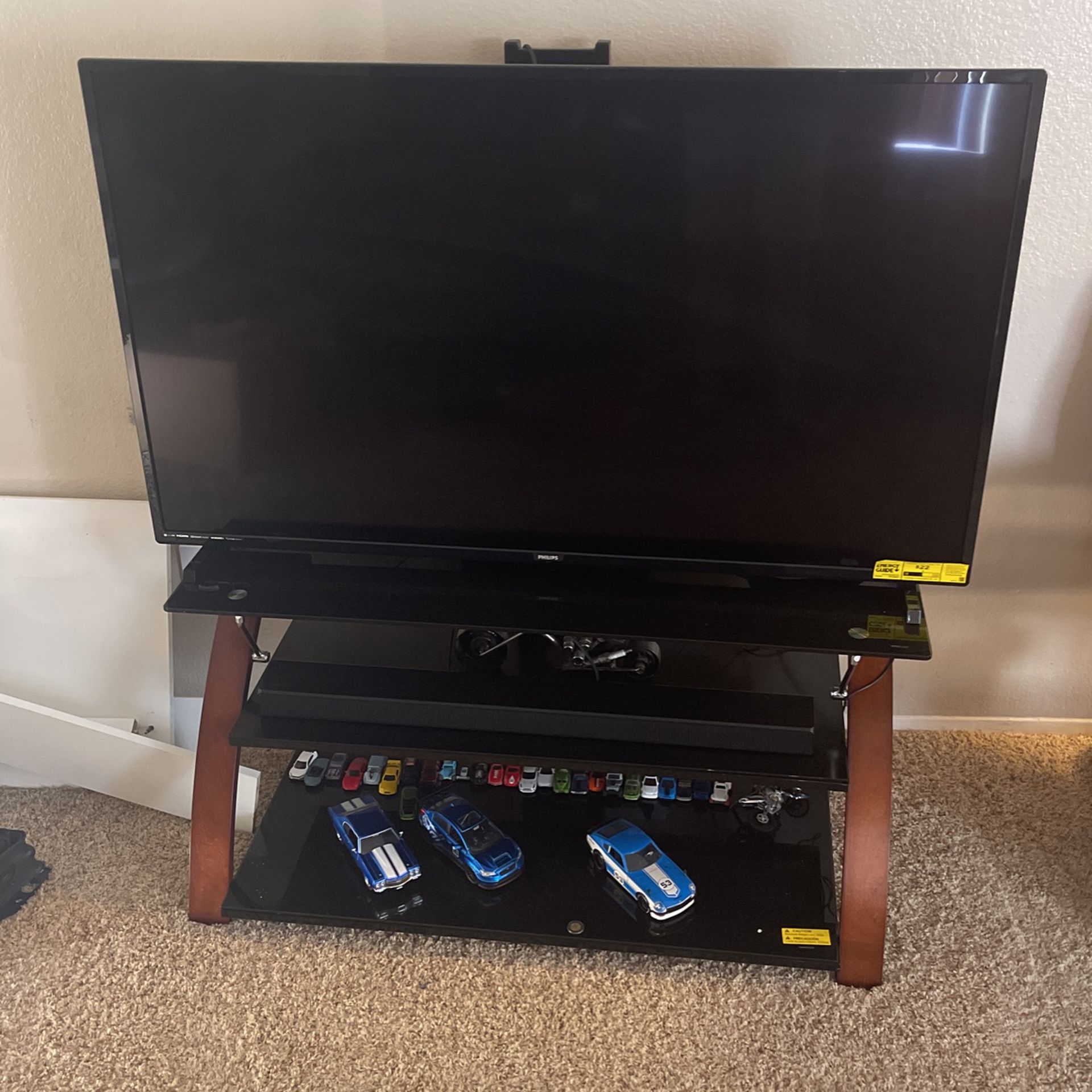 Combo TV stand with 55 inch Philips TV almost brand new