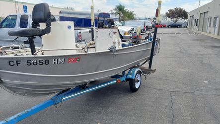 Valvo Westcoaster Welded Aluminum Center Console fishing boat. Runs great 👍. Thumbnail