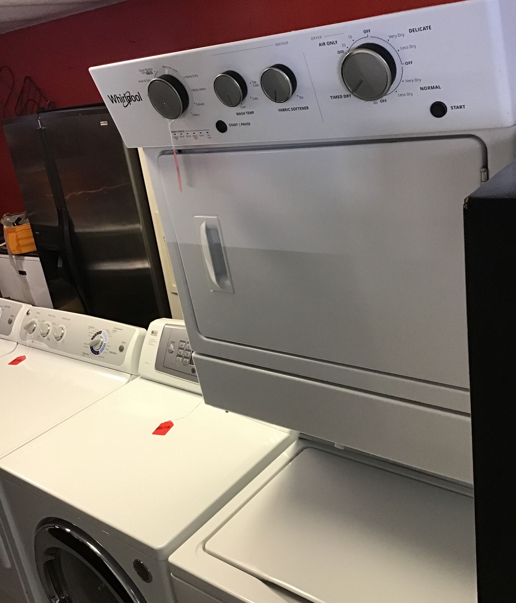 New scratch and dent whirlpool stackable washer and dryer. 1 year warranty