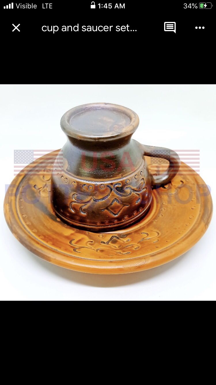 Handmade Pottery tea/coffee cup and saucer.