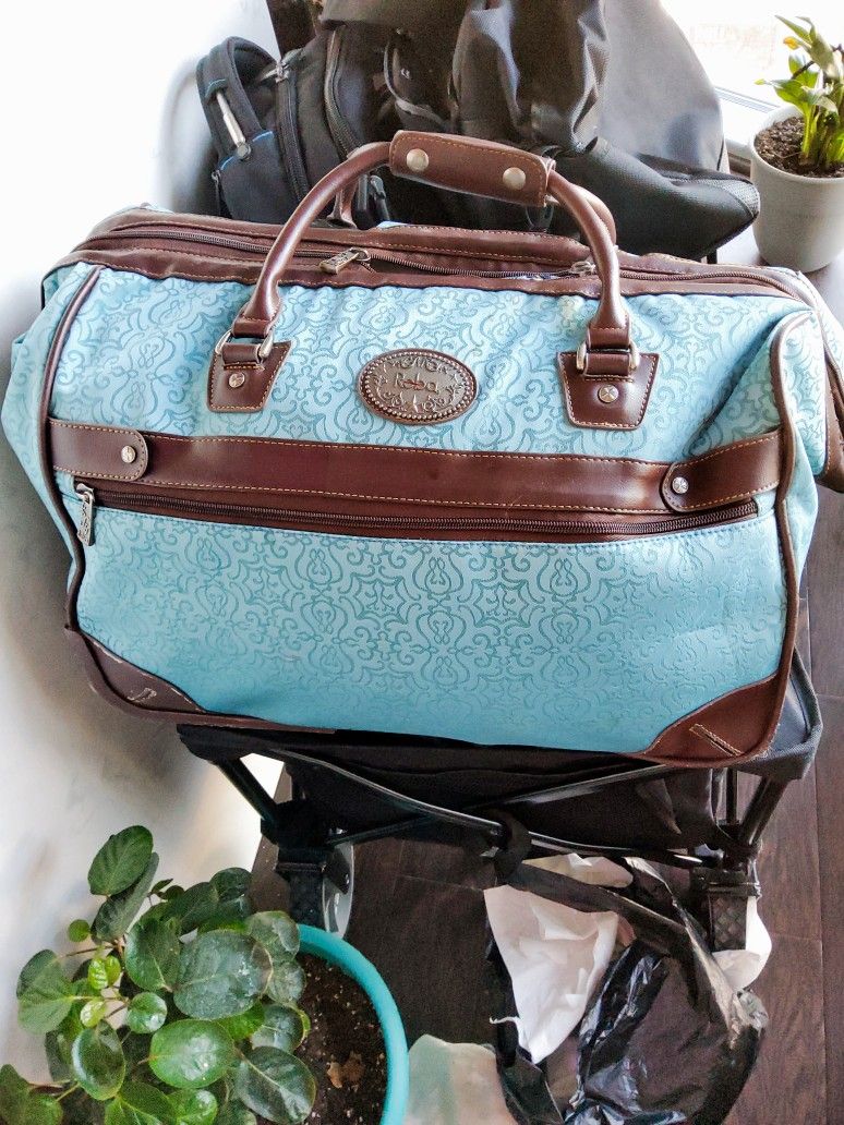 Reba Santa Fe IV Rolling Luggage Bag