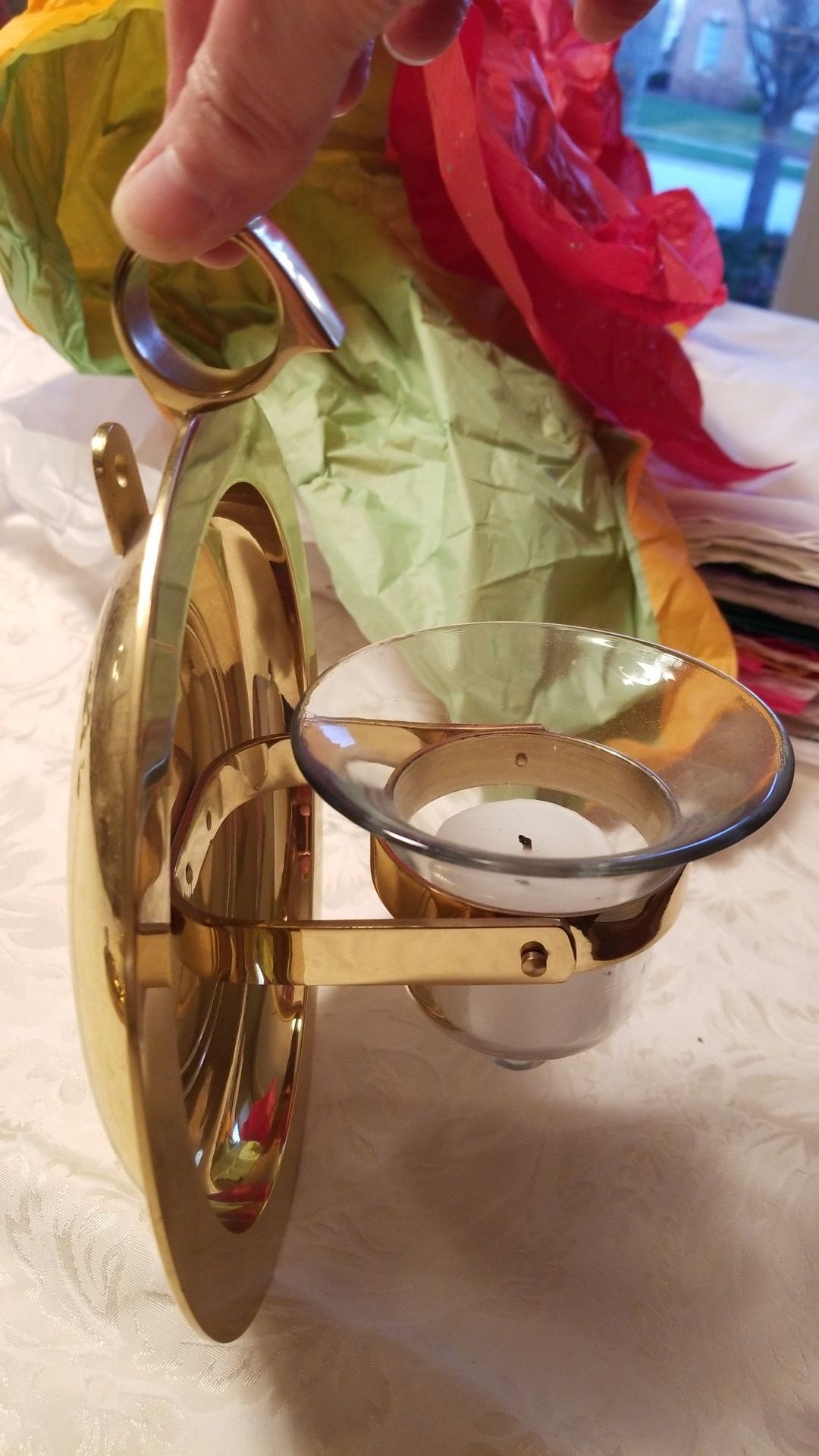 Brass candle holders, either free standing or can be hung on wall