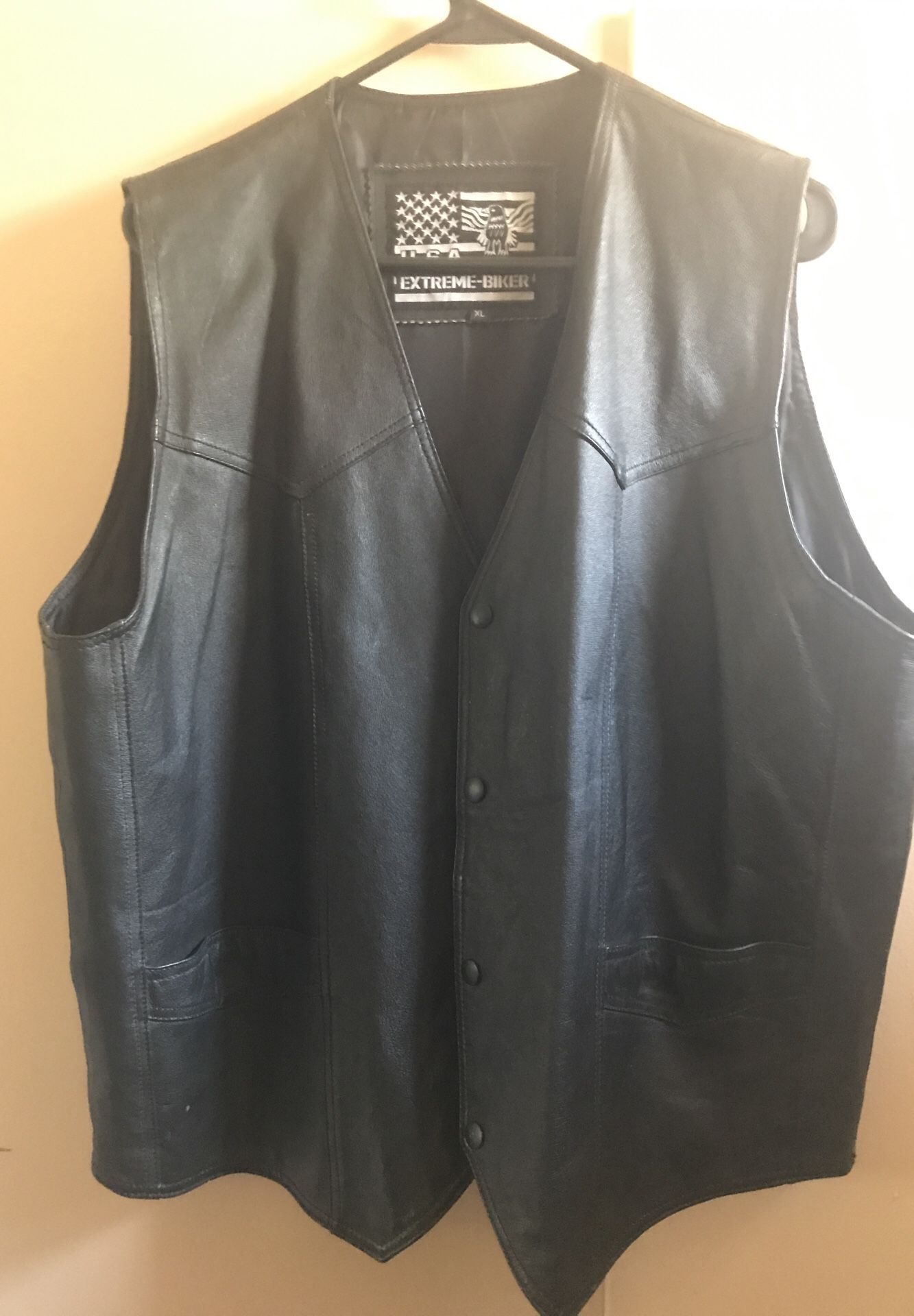 Leather vest, size Xl, USA extreme-biker, in good condition, asking $30, also Exl women’s Levi Victory outreach jacket asking $20 and and an 70’s bla