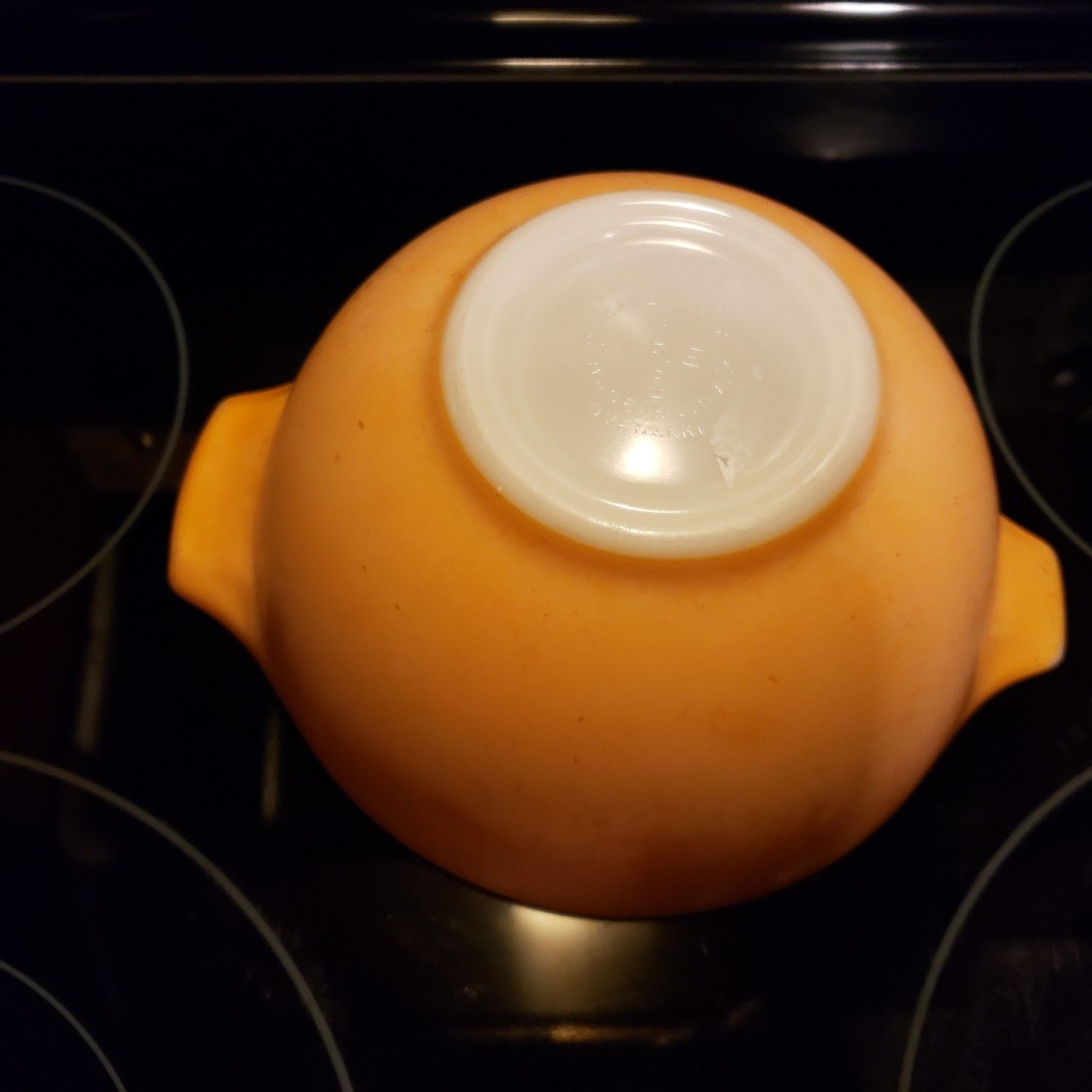 Pyrex small orange bowl..