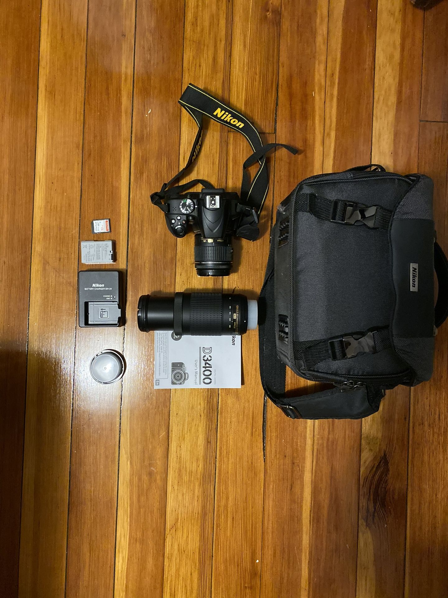 Nikon D3400 DSLR camera with accessories