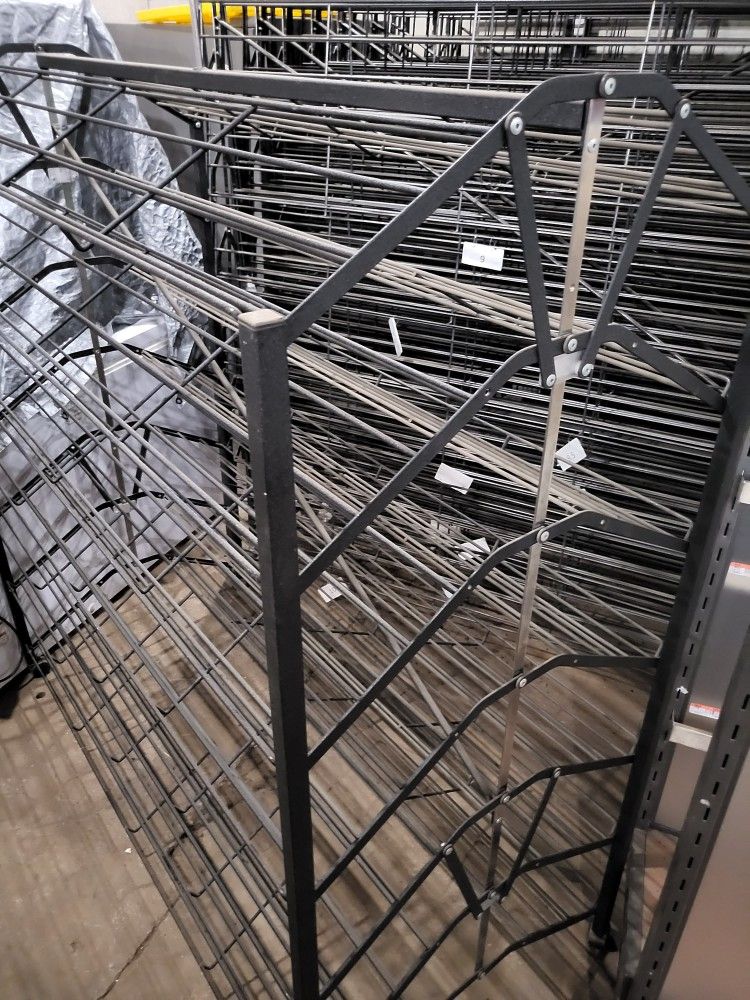Double Sided Display Rack On Wheels With 7 Shelves On Each Side, Black Metal