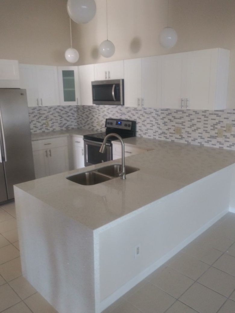 Solid wood kitchen complete with quartz
