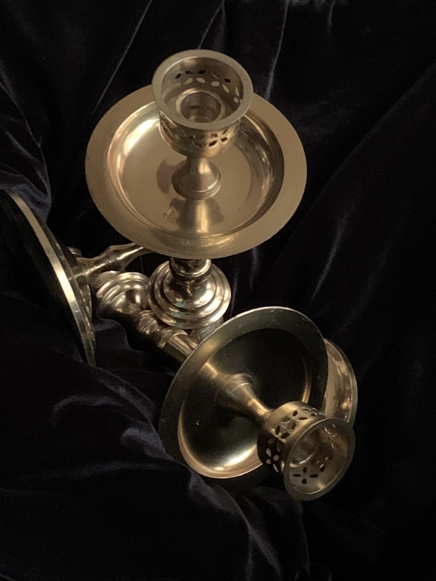 Brass wall candle holders.