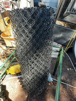 A Roll Of Black Vinyl Coated 4' Chainlink Fence Thumbnail