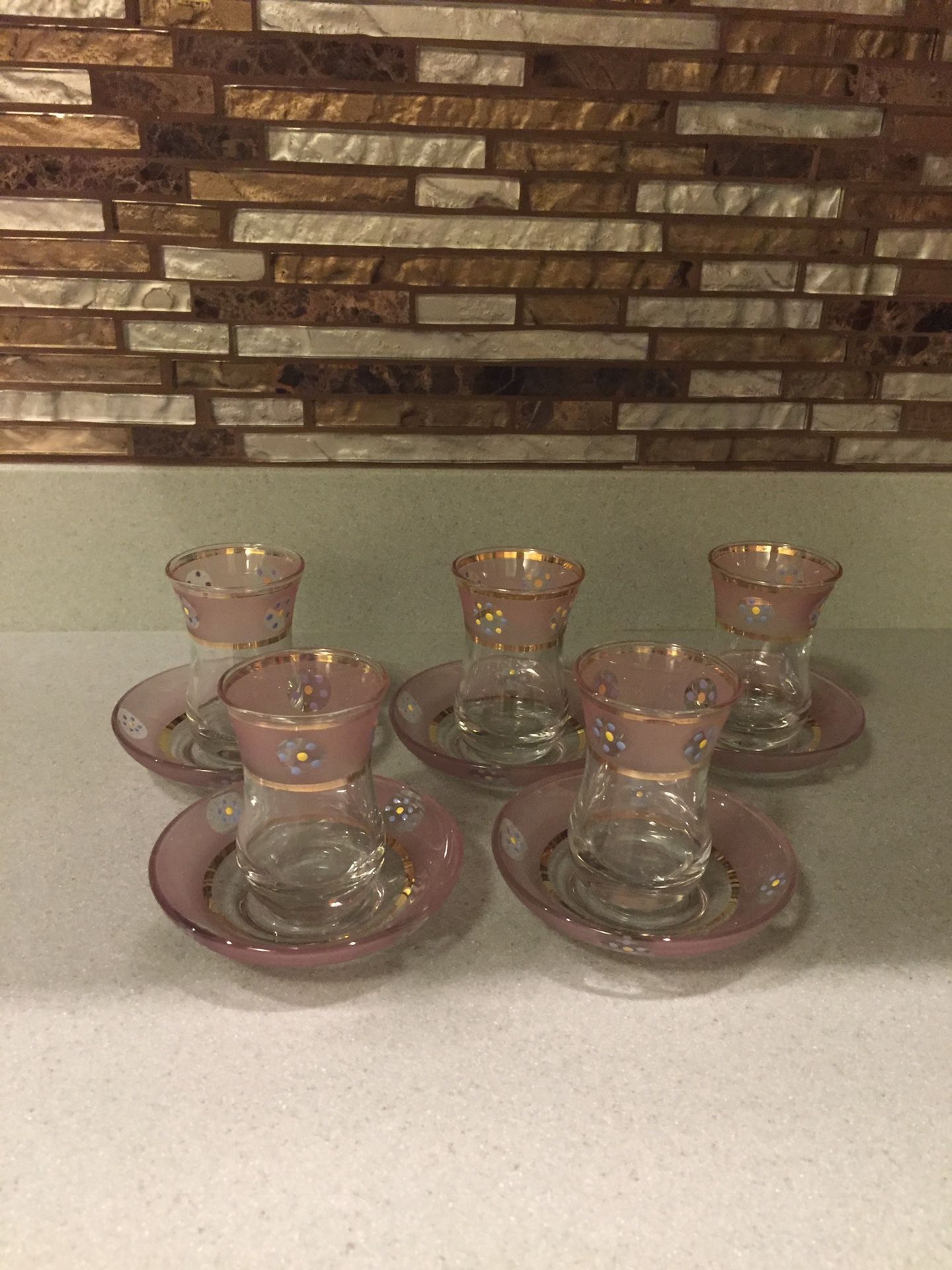 5 TEA CUPS WITH MATCHING PLATES