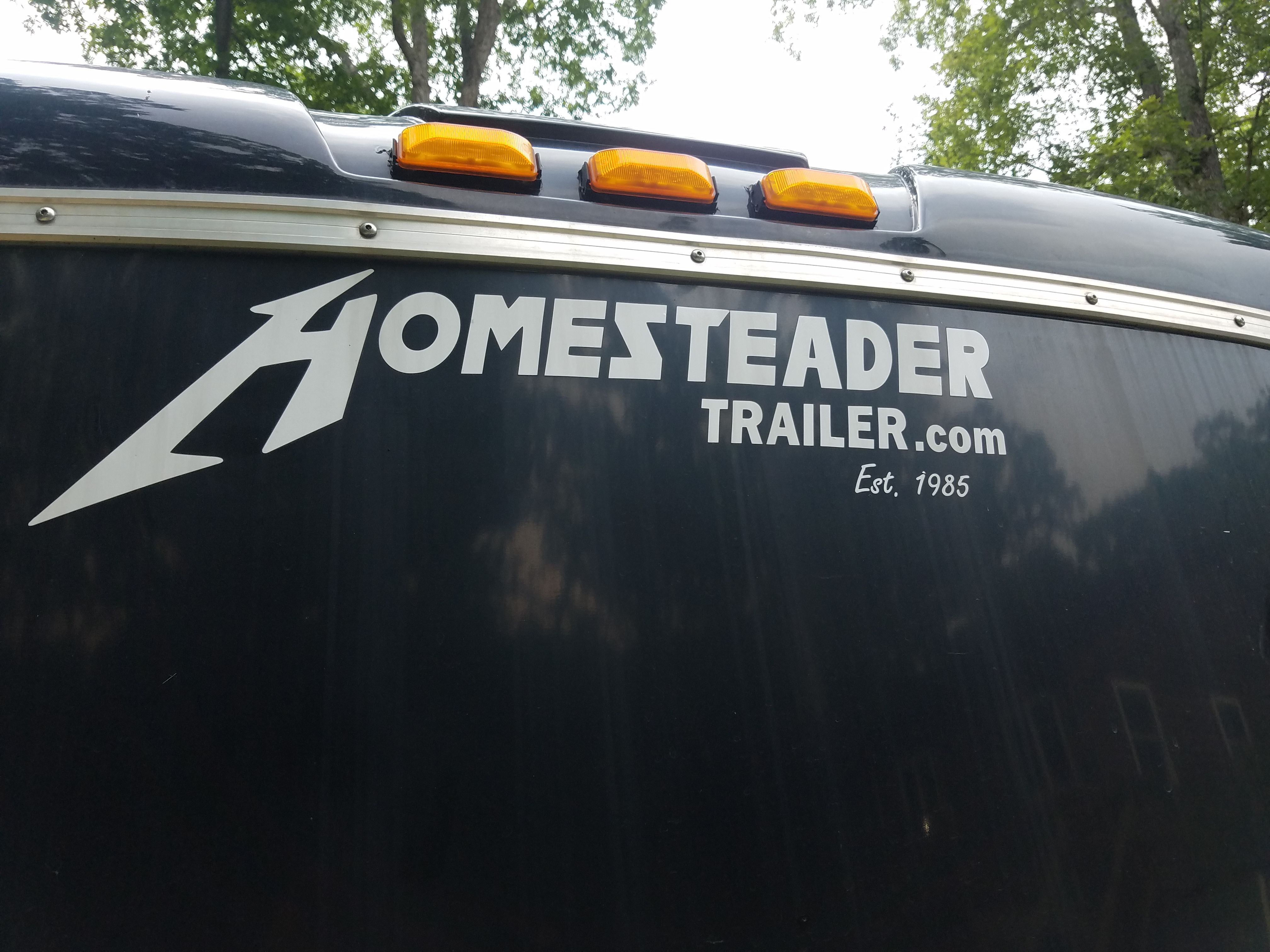 1984 dodge dump and 2012 trailer