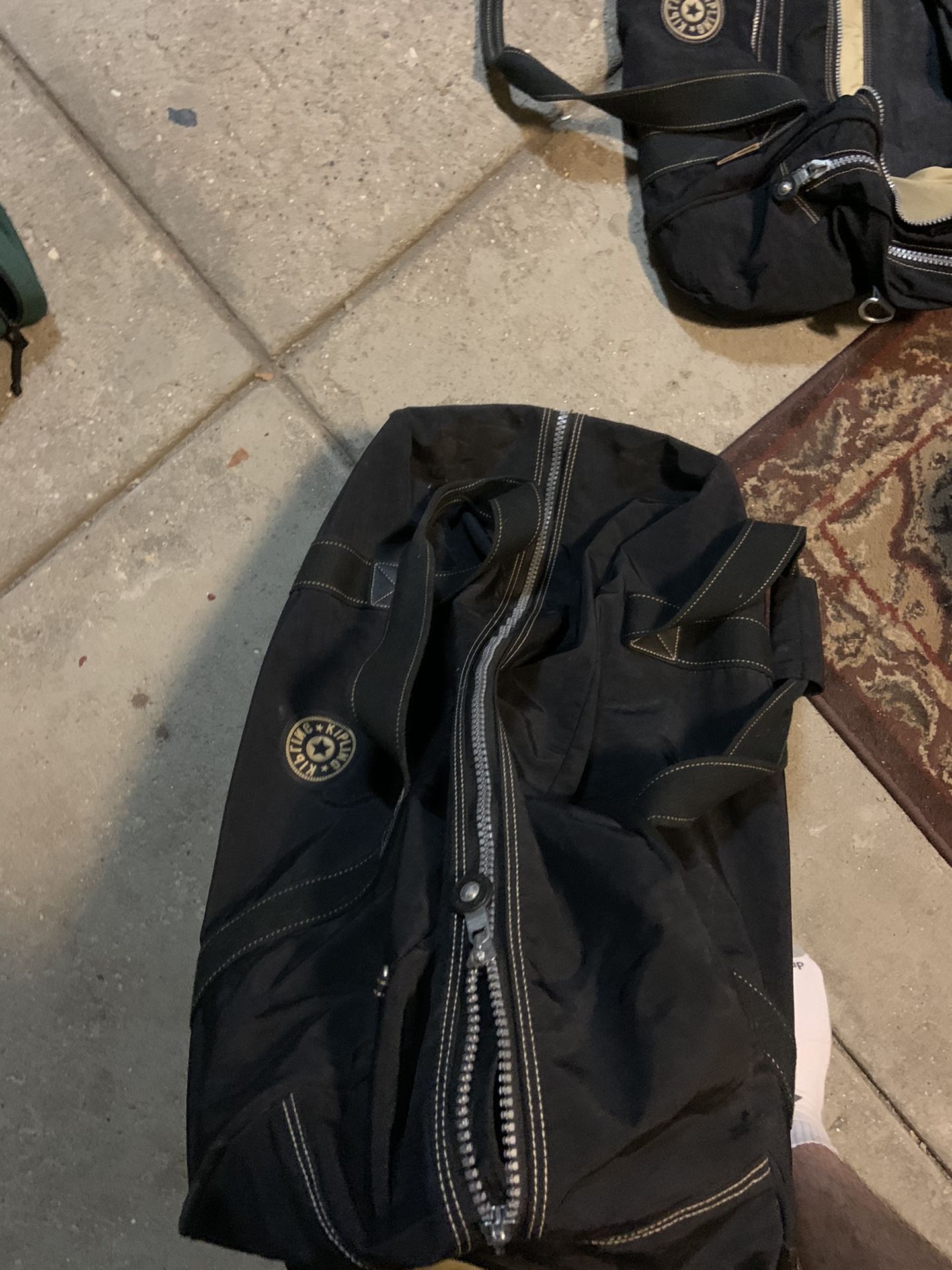 Kipling Rolling duffel bag