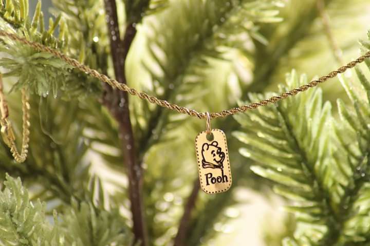 14k gold rope bracelet with 14k winnie the pooh charm