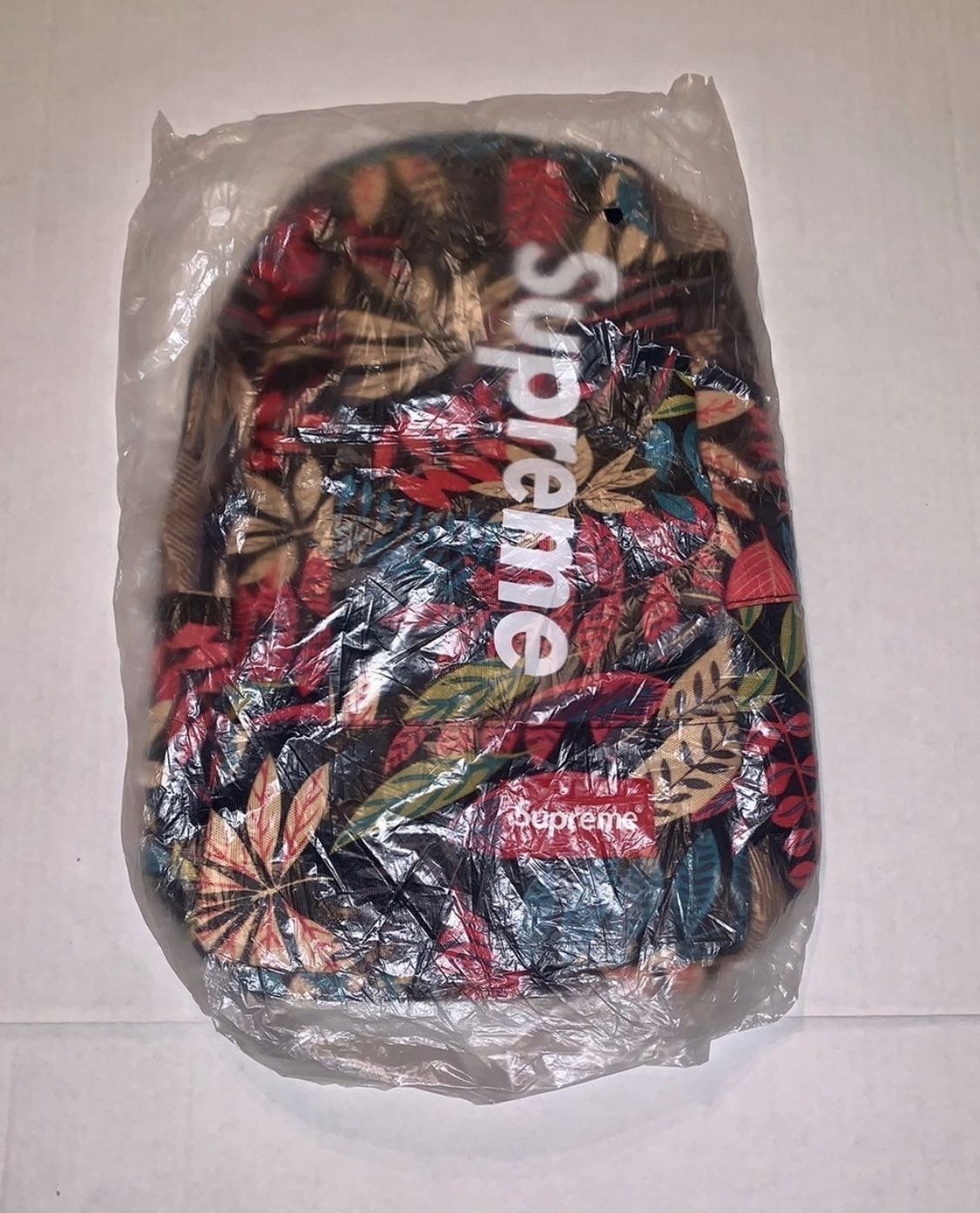 SUPREME RED LEAVES CROSS-BODY PACK
