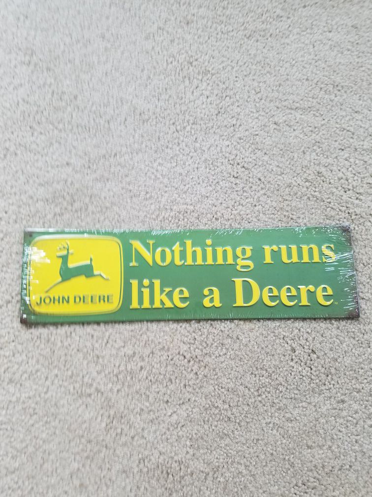 Nothing runs like john deere tractor embossed metal sign