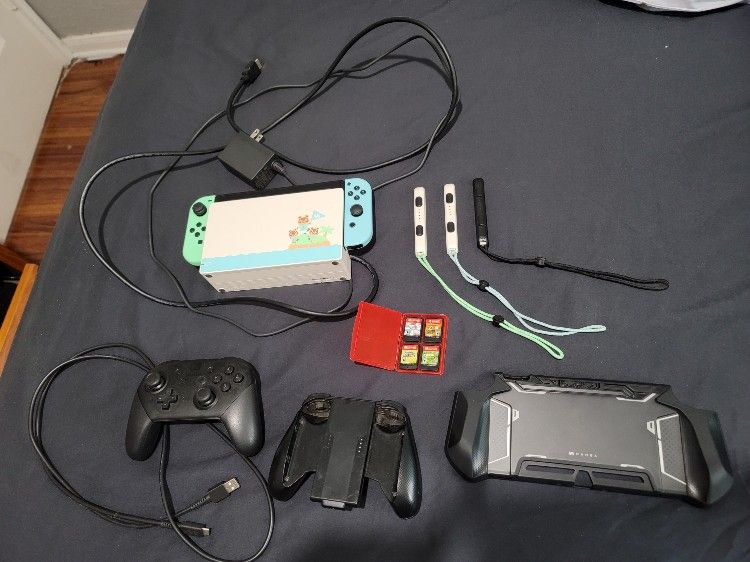 Nintendo Switch Animal Crossing Edition w/128GB sd card, Pro Controller, 4 games, and accessories