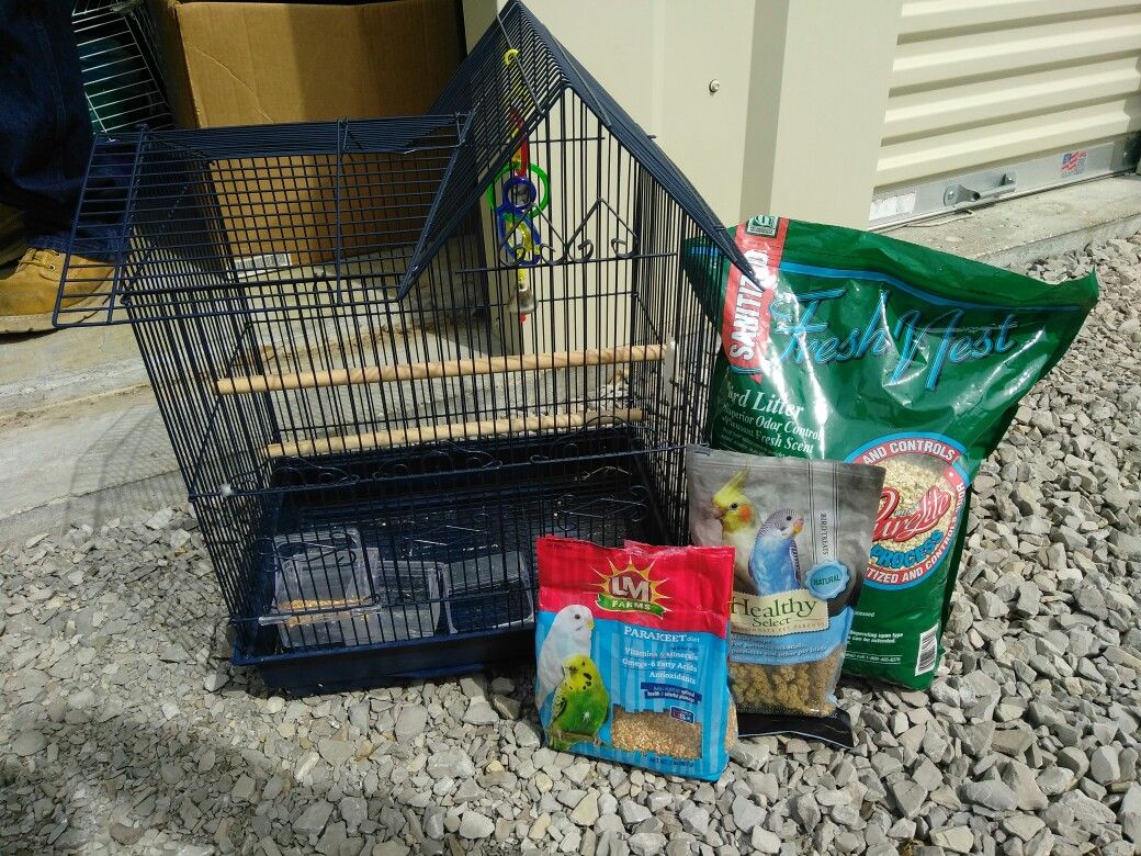 Bird cage and stuff to go with it