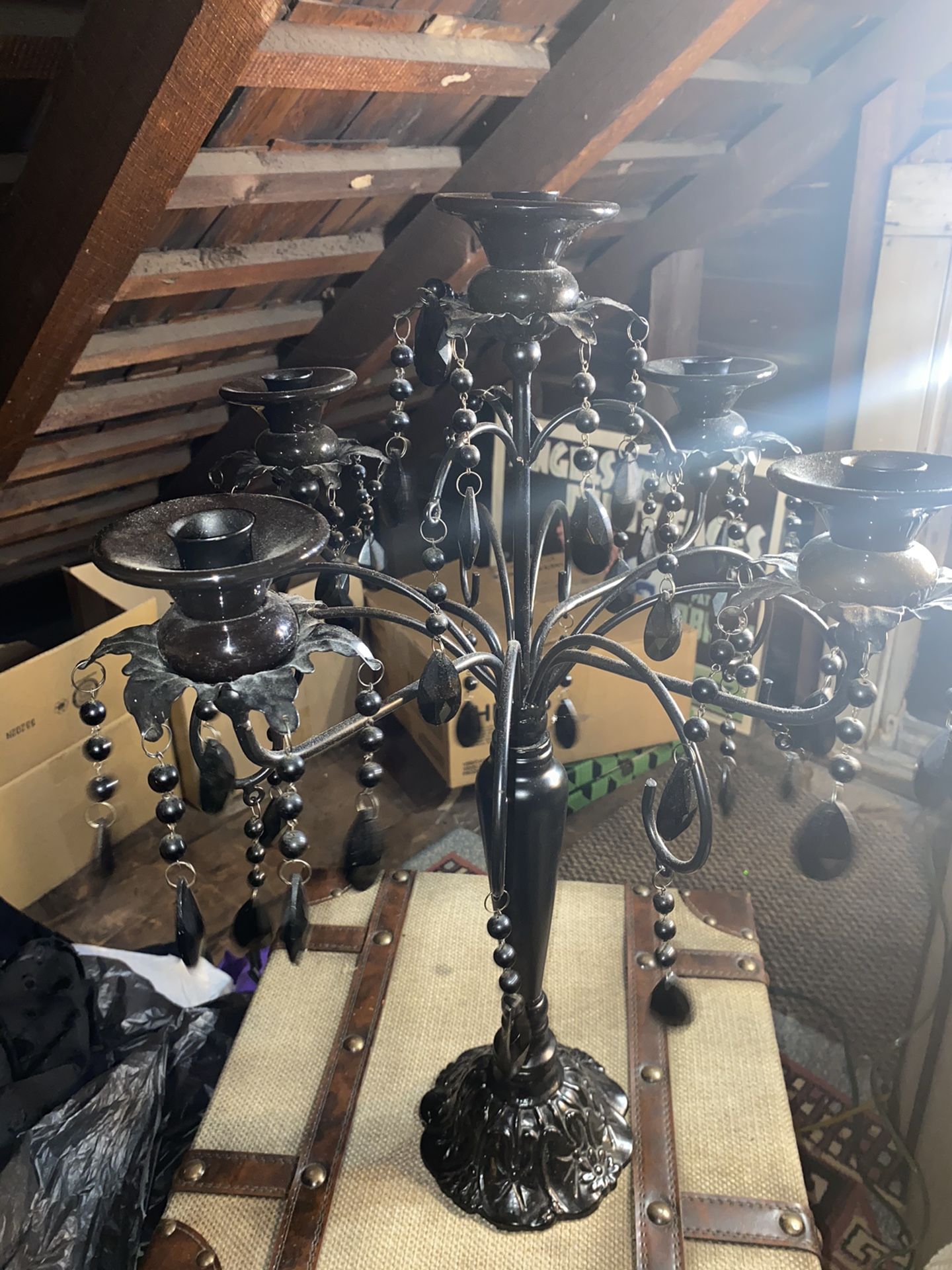 Black Metal in porcelain candelabra