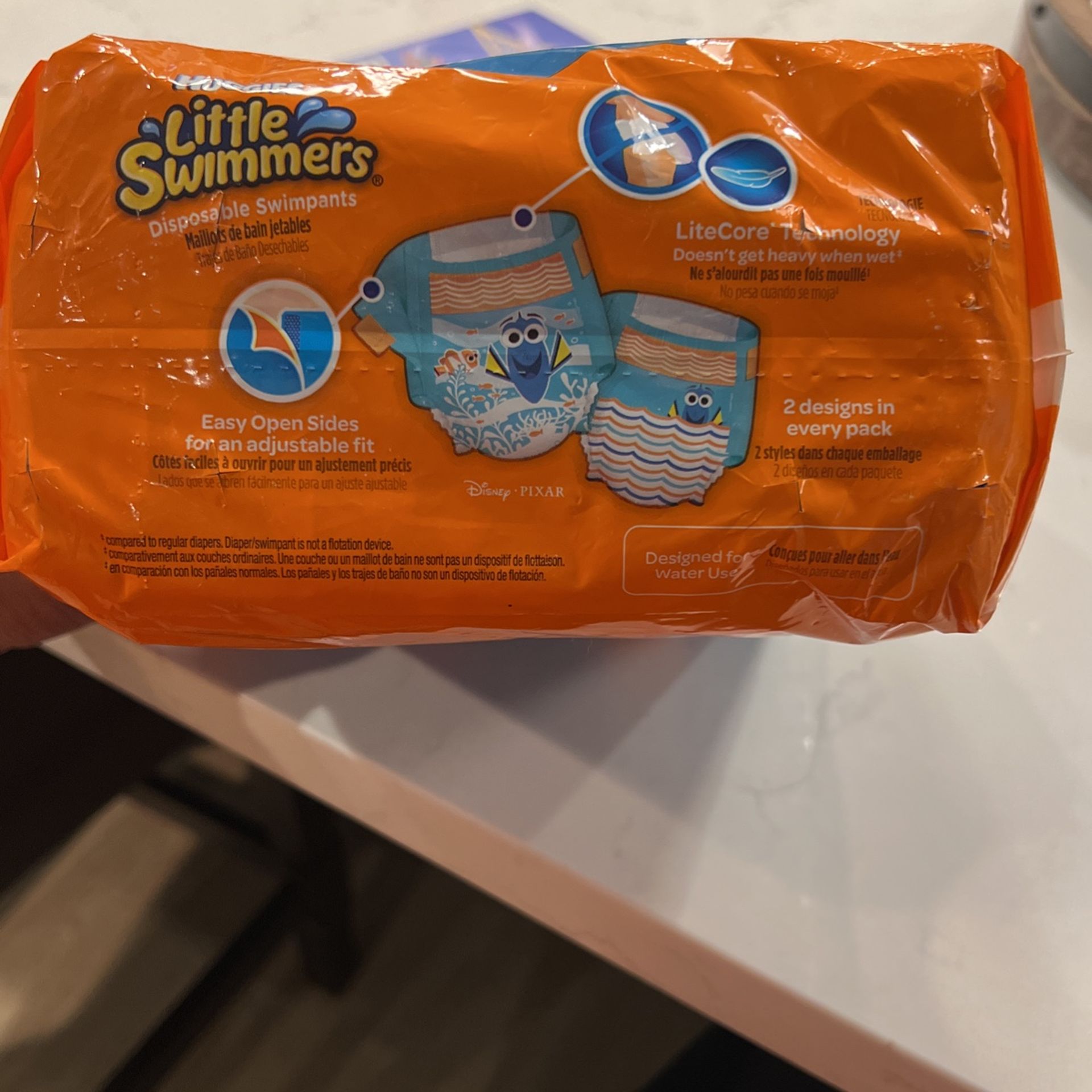 🆕 Huggies Little Swimmers Disposable Swim Diapers, Swimpants, Size 4 Medium (24-34 Pound), 18 Count