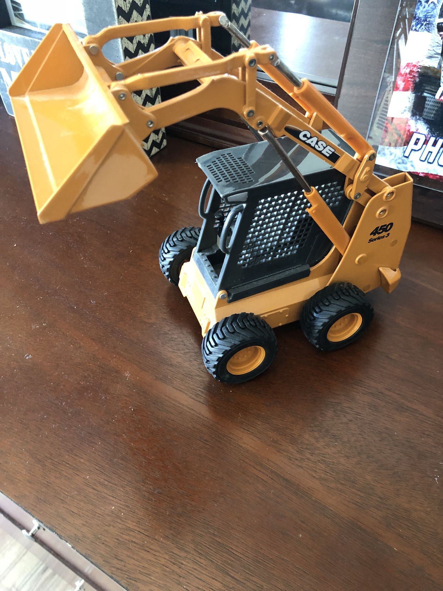 Metal model bobcat excavator.